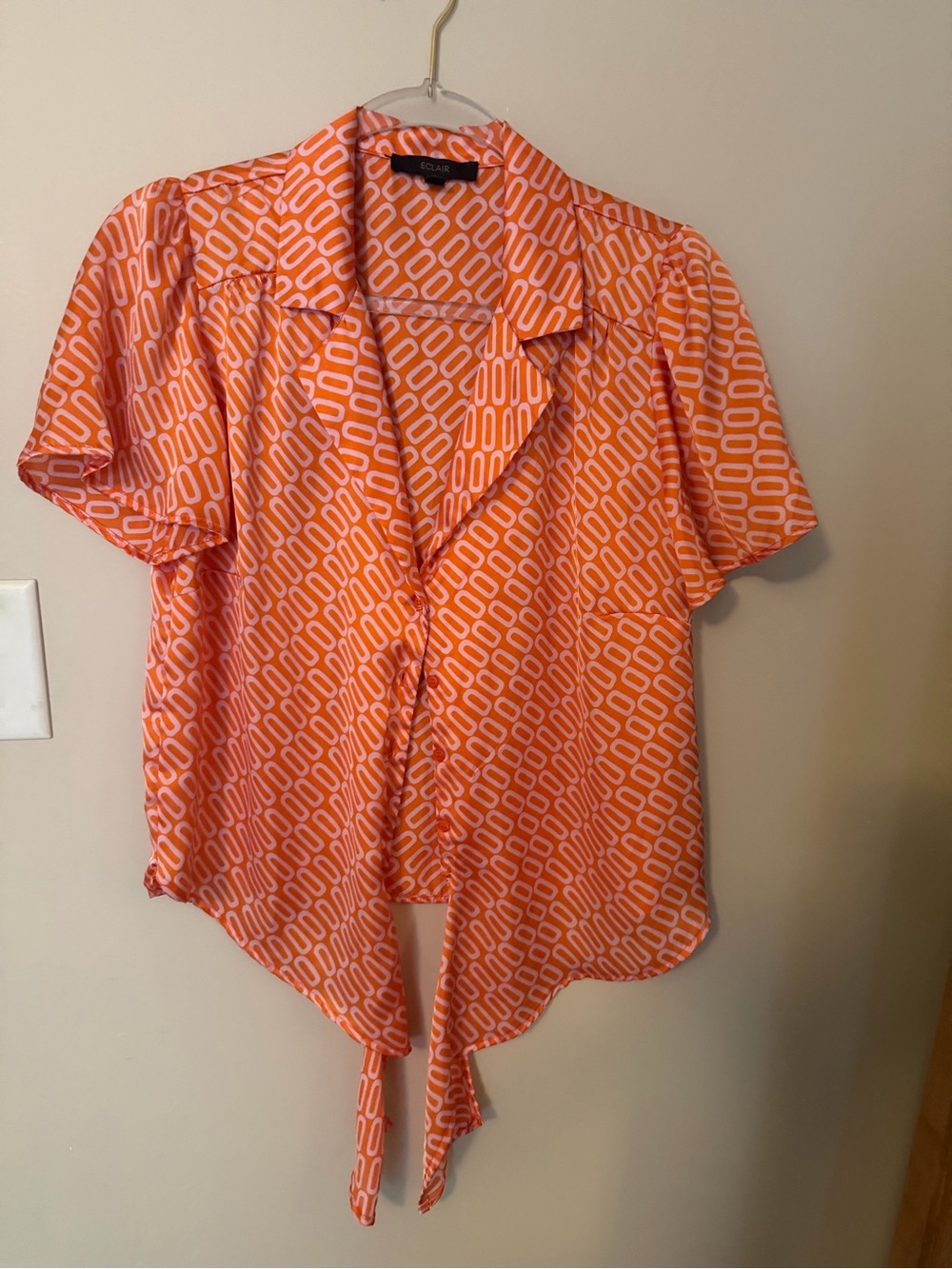 Tie-Front Short Sleeve Blouse in Orange Geometric Print
